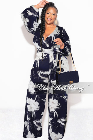 Final Sale Plus Size Faux Wrap Jumpsuit with Waist Tie in Navy and White Floral Print