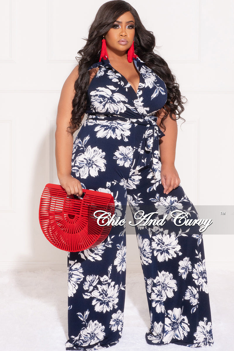 Final Sale Plus Size Faux Wrap Halter Jumpsuit with Waist Tie in Navy and White Floral Print