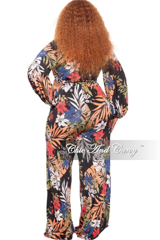 Final Sale Plus Size Long Sleeve Faux Wrap Jumpsuit with Attached Tie in Navy Floral Print